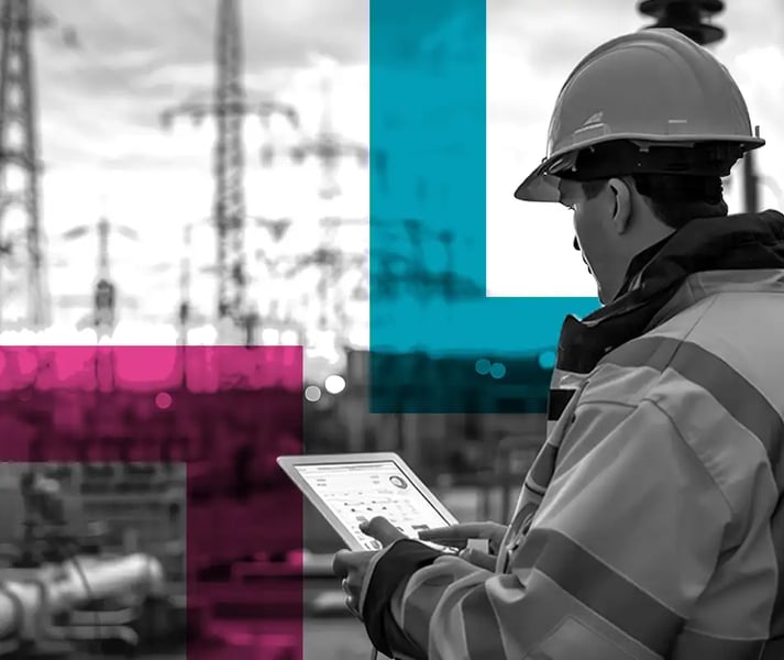 Man on ipad with phone towers in background