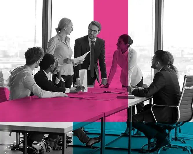 Business people around a table talking in a meeting