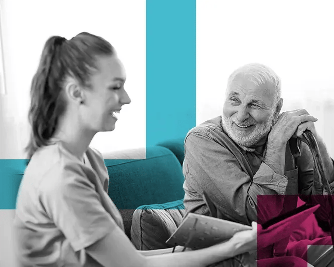 Nurse with elderly man at aged care facility