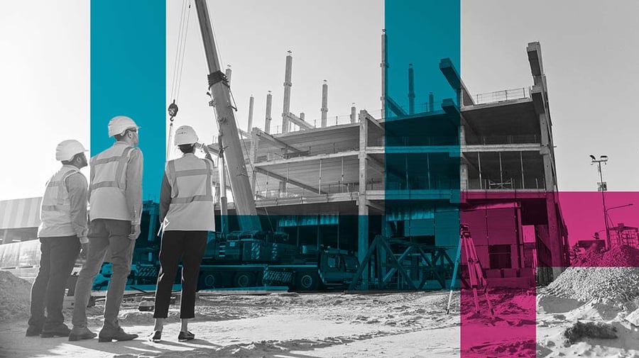 Safety professionals looking onto a construction site